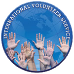 The image shows a logo with the text  INTERNATIONAL VOLUNTEER SERVICE  prominently displayed, along with a globe symbolizing global reach and hands reaching upwards towards it, indicating inclusivity and support for volunteers worldwide.